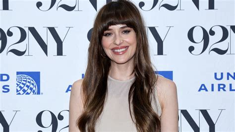 dakota johnson leaked|Dakota Johnson Dazzles in Saint Laurent Nude Dress。